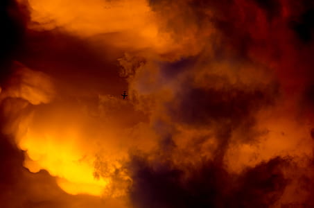 Airplane Silhouette and Orange Sky thumbnail
