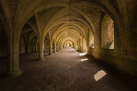 hallway under gray concrete arc thumbnail