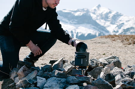 man opening boiling portable pot thumbnail