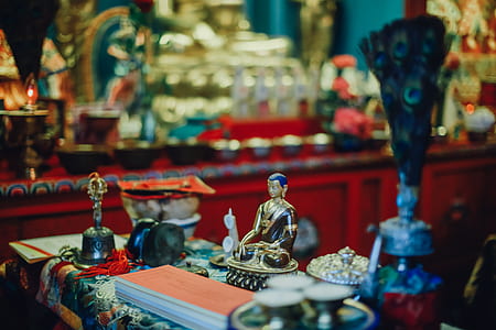 selective focus photography of Hindu Deity figurine thumbnail