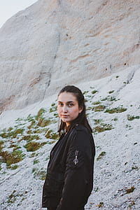 woman beside mountain looking left side thumbnail