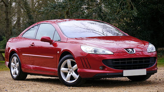red Peugeot coupe thumbnail