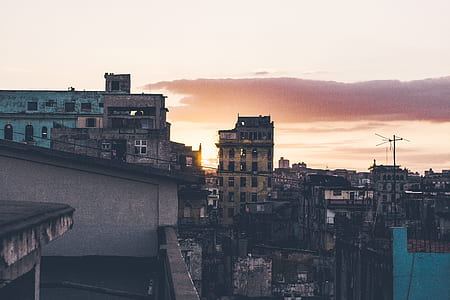aerial view of buildings during orange sky thumbnail