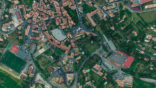 satellite photography of road and houses thumbnail