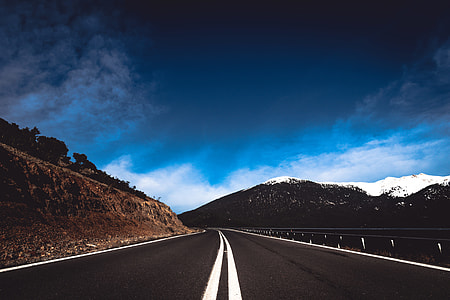 empty asphalt road with mountain as background photo thumbnail