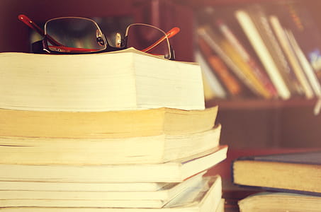 Books and reading glass thumbnail