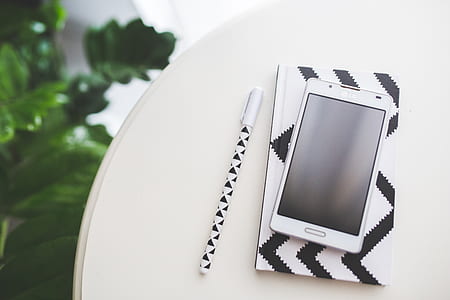 white LG phablet on top of rounded table thumbnail