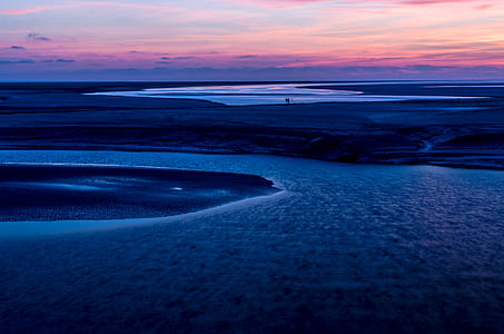 areal view of body of water and land thumbnail