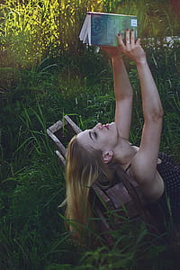 Woman Holding Book thumbnail