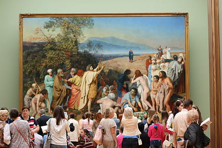 people looking at religious painting thumbnail