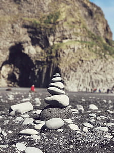 depth of field photography of rock balancing thumbnail