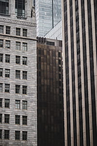 structural shot of gray and brown concrete buildings thumbnail