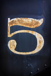 white g number on blue background thumbnail