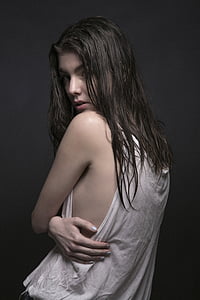 woman wearing white tank top thumbnail