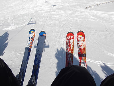 pair of red ski boards thumbnail