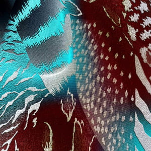 brown, gray,and teal textile thumbnail