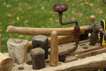 hand tools on top of brown rack thumbnail