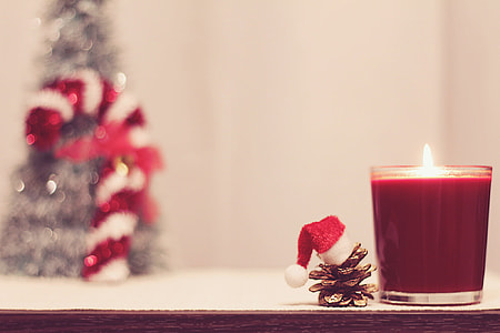 red candle on table thumbnail