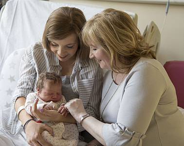 women carrying baby thumbnail