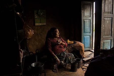 woman sitting looking on door thumbnail