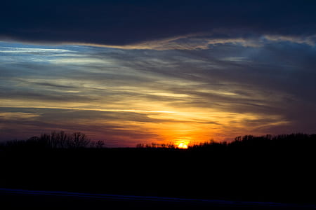 blue, white, and yellow skies during sunset thumbnail