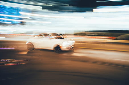 white 3-door hatchback on road thumbnail
