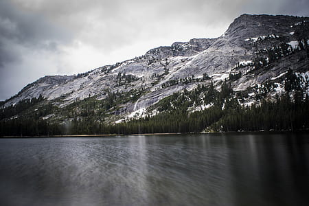 landscape photography of mountains and trees thumbnail