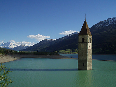 gray concrete building in body of water thumbnail