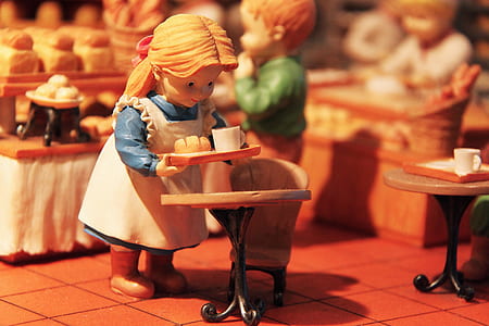 Cinderella plastic mini figure in shallow focus photography thumbnail