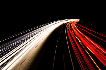 time lapsed photography of vehicles on road during nighttime thumbnail