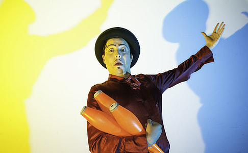 man holding three orange containers thumbnail