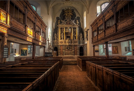 brown wooden bench inside church thumbnail