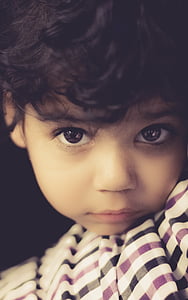 close-up photography of a boy thumbnail
