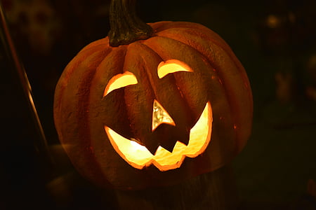 selective focus of lighted pumpkin thumbnail
