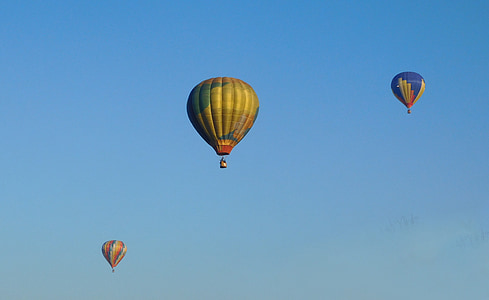 three hot air balloons on sky during daytime thumbnail