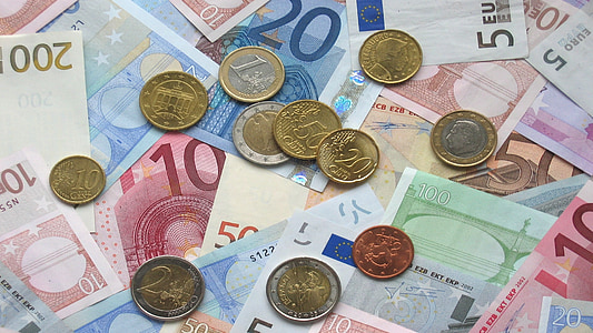 assorted banknotes and coins thumbnail