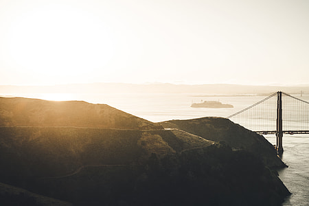 aerial view of mountain and bridge thumbnail