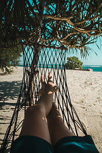 person lying on hammock thumbnail
