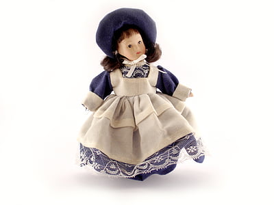 beige and purple porcelain doll thumbnail
