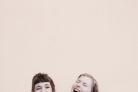 photo of two women laughing together thumbnail