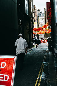 man walking on street thumbnail