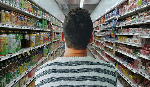 Photo illustration of man shopping in a modern grocery store thumbnail