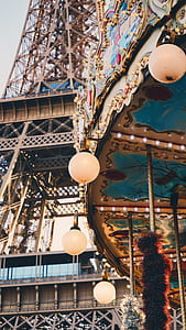 low angle view of building and ball carousel light thumbnail
