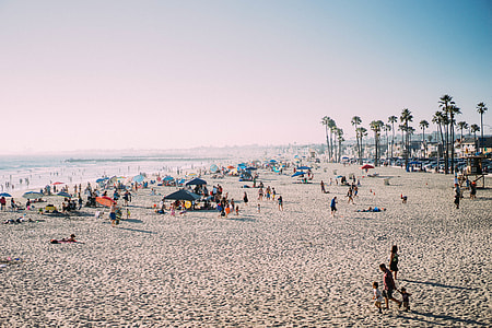people enjoying the summer going to the beach thumbnail