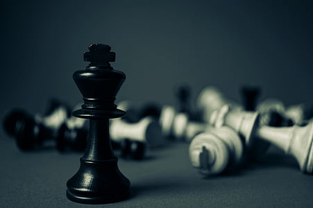 black king chess piece selective focus photo thumbnail