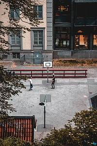 two men playing basketball thumbnail