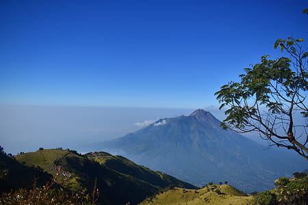 mountain under blue sky thumbnail