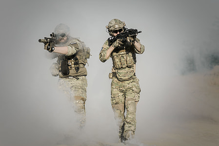 photography of two soldier rifles thumbnail