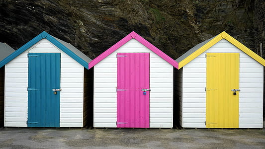 three white wooden sheds thumbnail