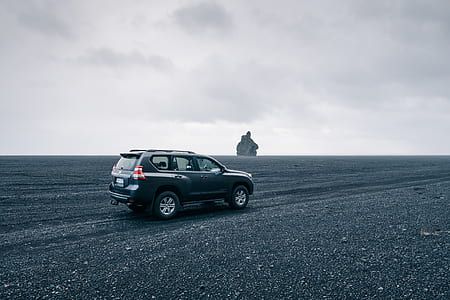 gray SUV traveling on dirt road at daytime thumbnail